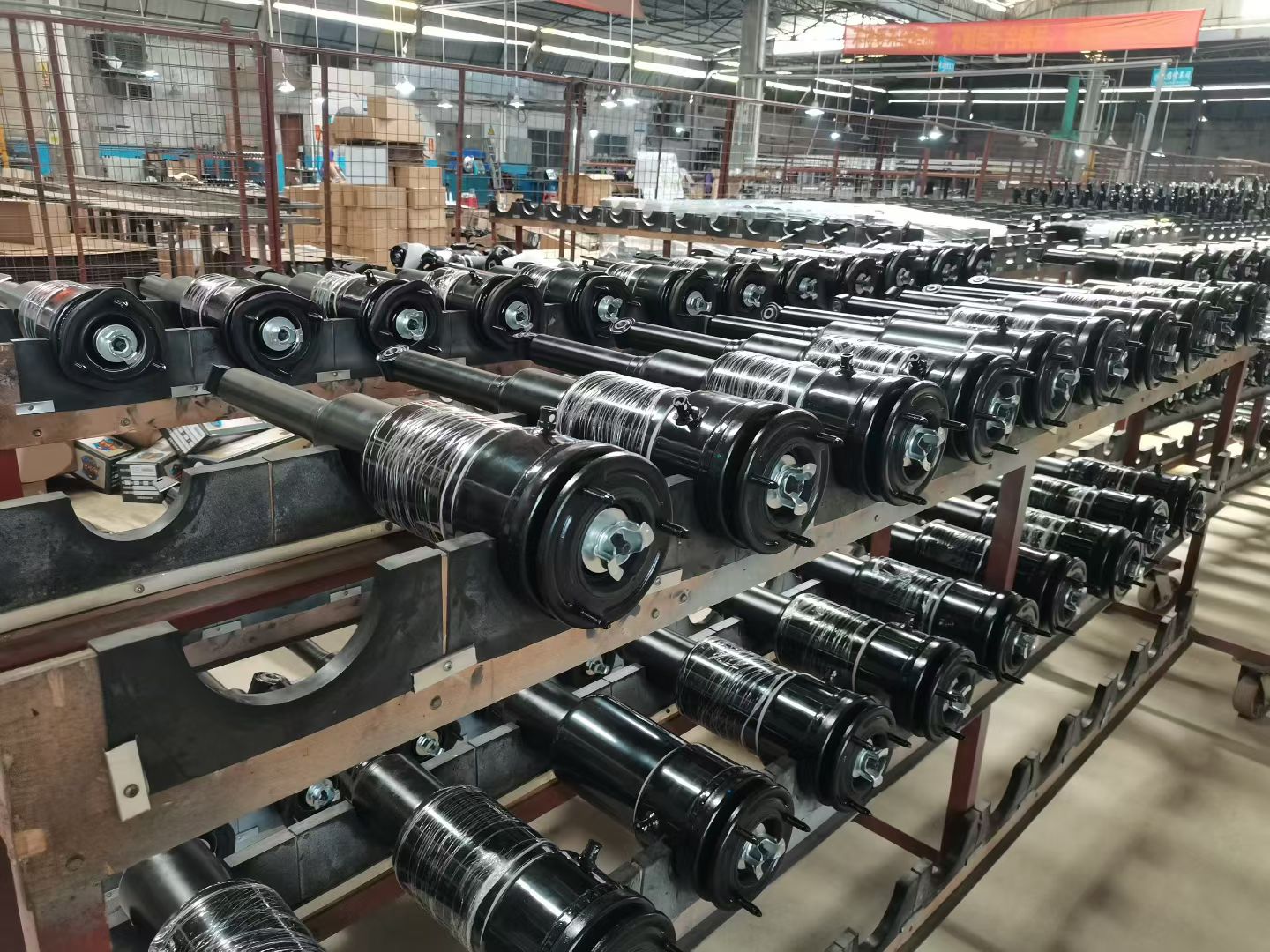 Air suspension assemblies on racks in the workshop